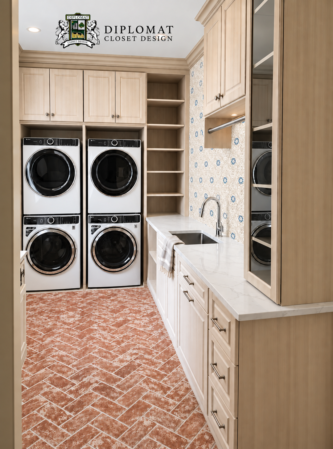 Light wood custom laundry room with stacked washer and dryer pairs, sink counter and terracotta tile floor